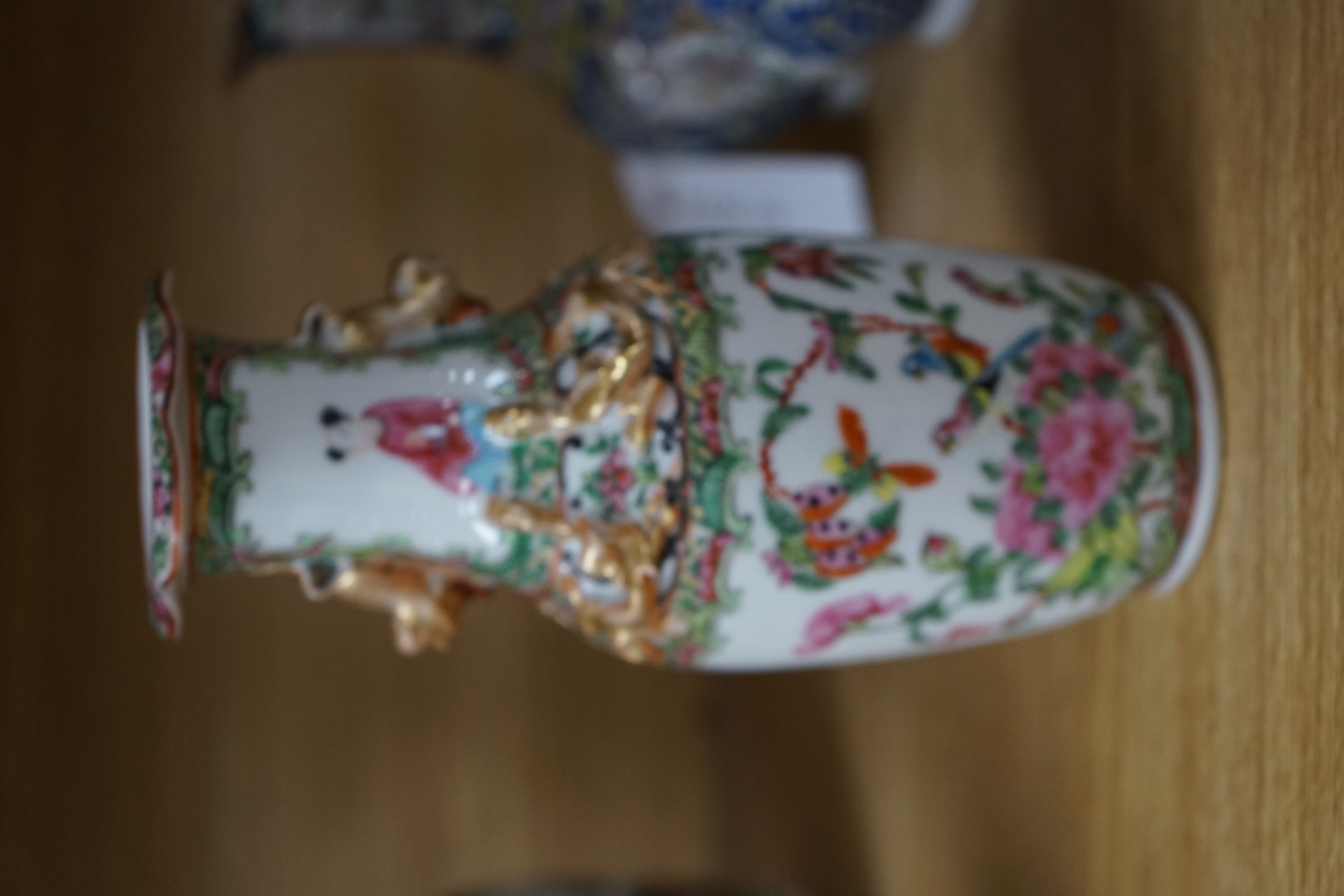 Four 19th century Chinese famille rose vases, 21cm